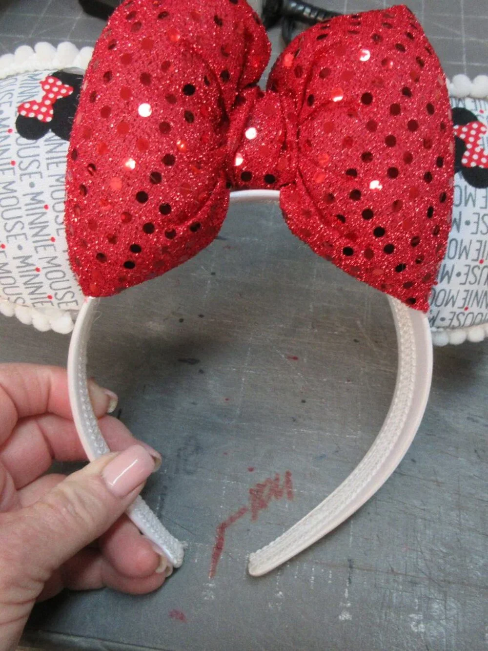 Minnie Mouse Ears - White trim, red Sequin bow fits an adult